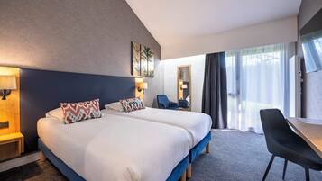 Tweepersoonskamer | Een bureau, geluiddichte muren, gratis babybedden, gratis wifi