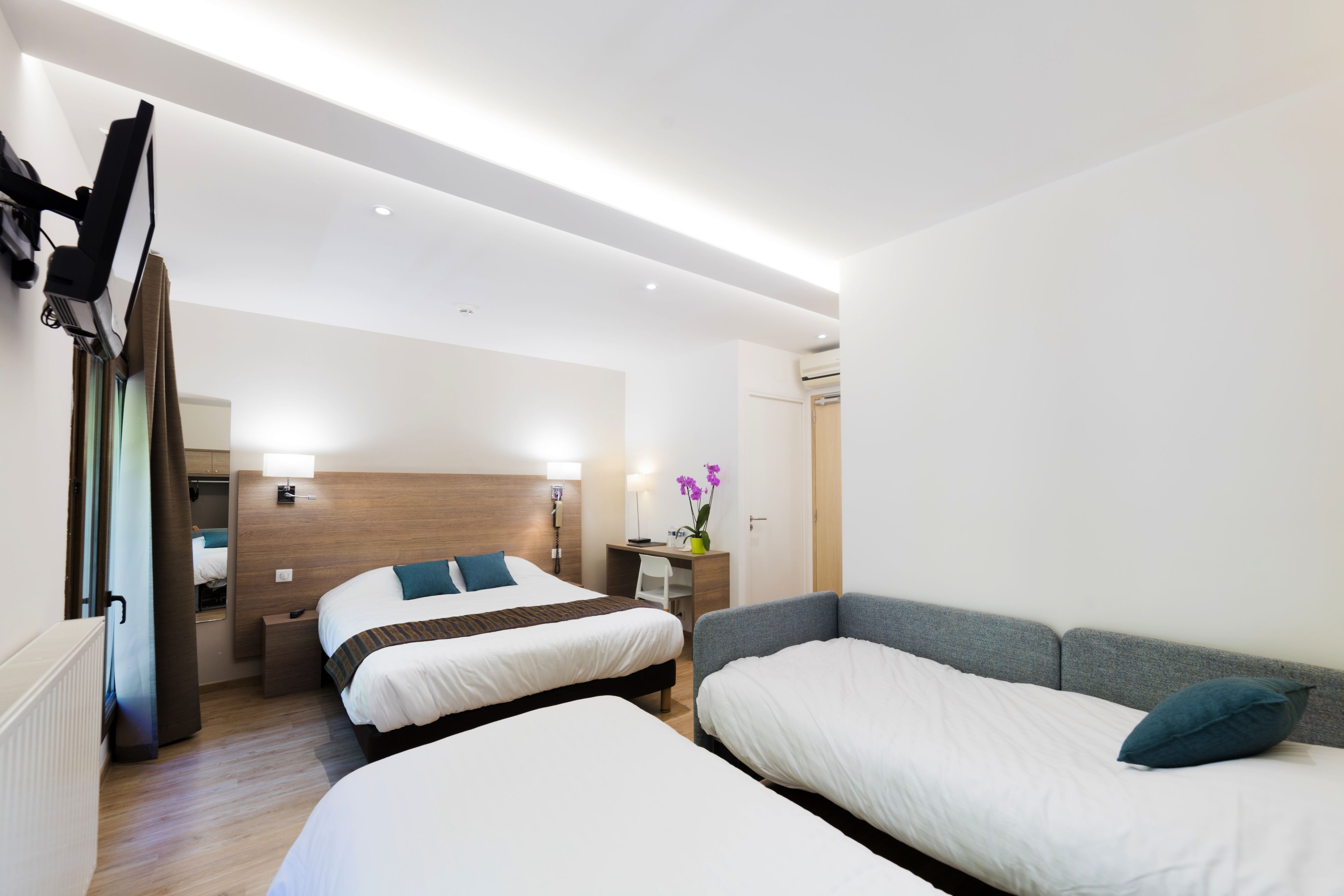 quadruple room, bathtub | in-room safe, desk, laptop workspace, iron/ironing board