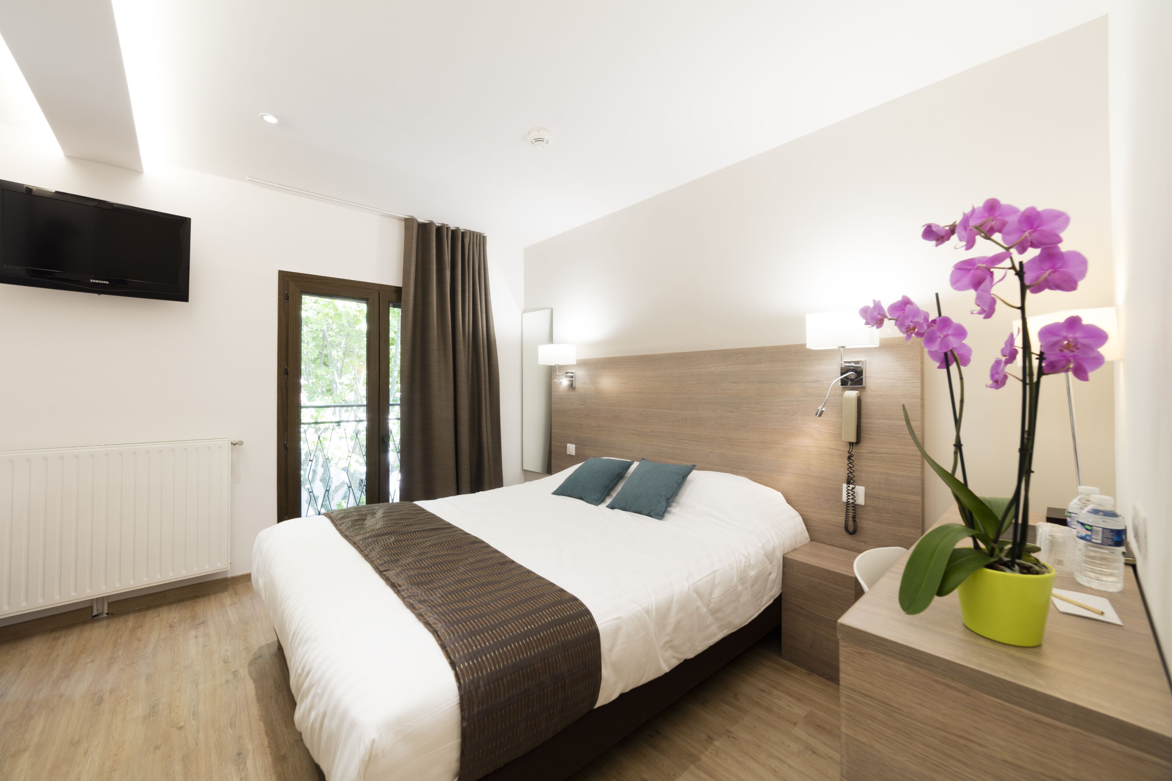 quadruple room, bathtub | in-room safe, desk, laptop workspace, iron/ironing board