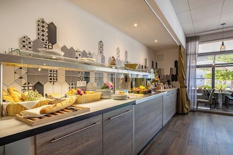 Daily buffet breakfast for a fee. Hotel Restaurant Le Cours