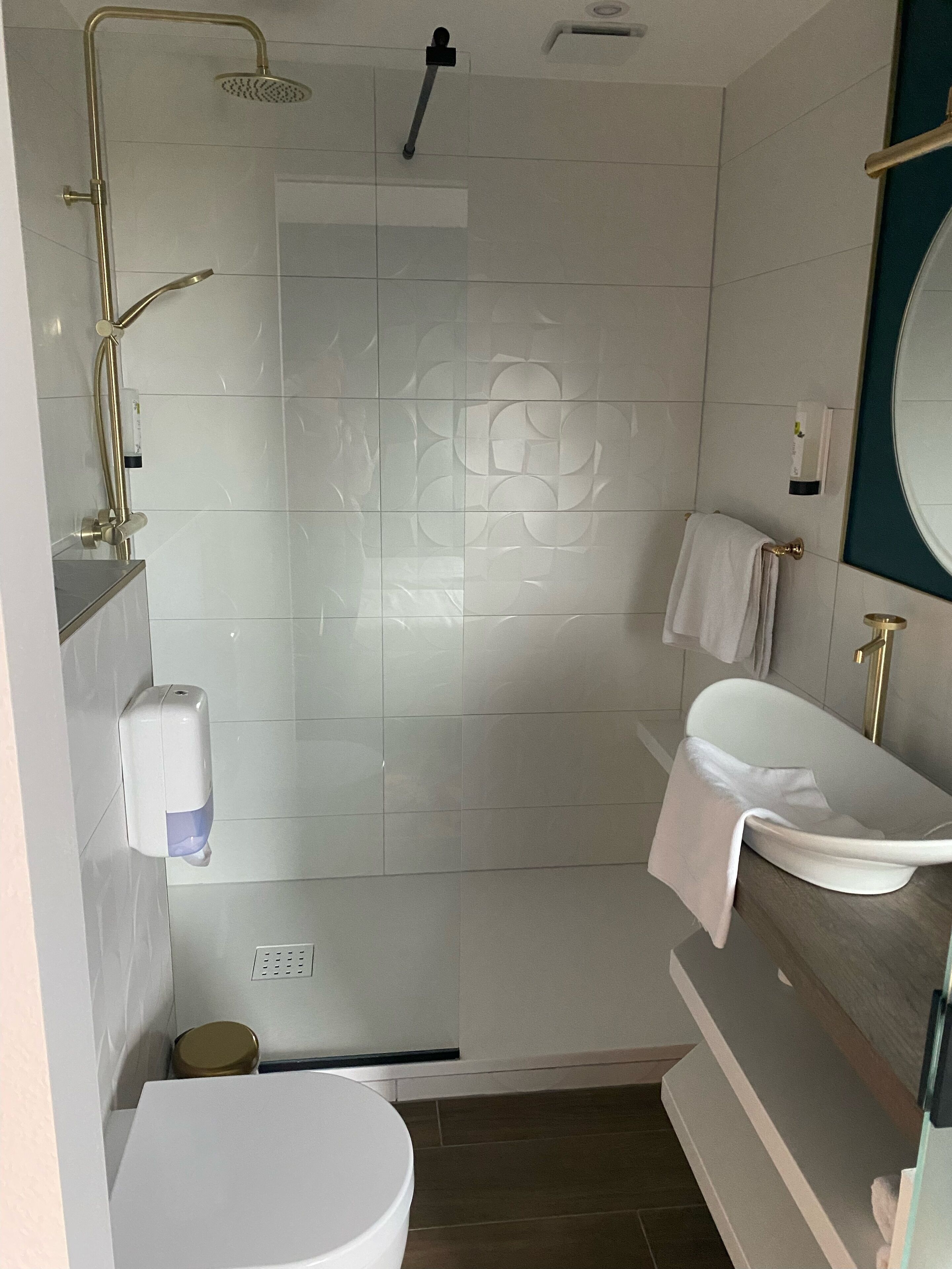 superior twin room | bathroom | hair dryer, towels