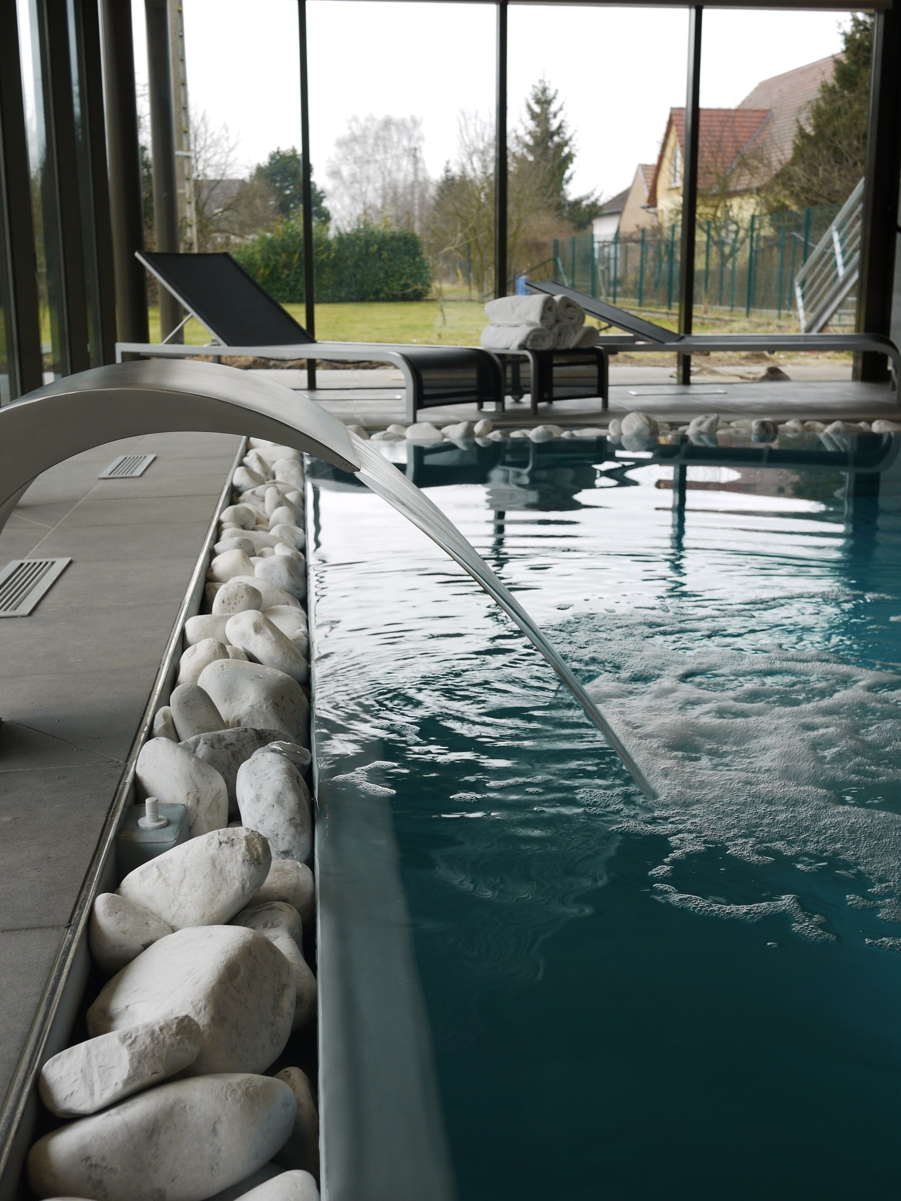 indoor pool, open 9:30 am to 8:00 pm, pool loungers