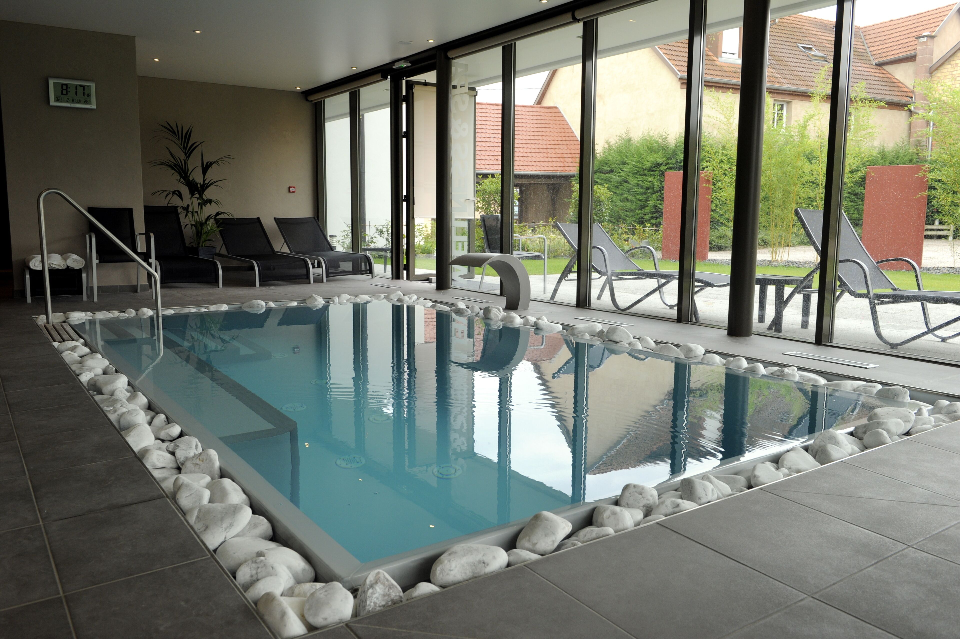 indoor pool, open 9:30 am to 8:00 pm, pool loungers