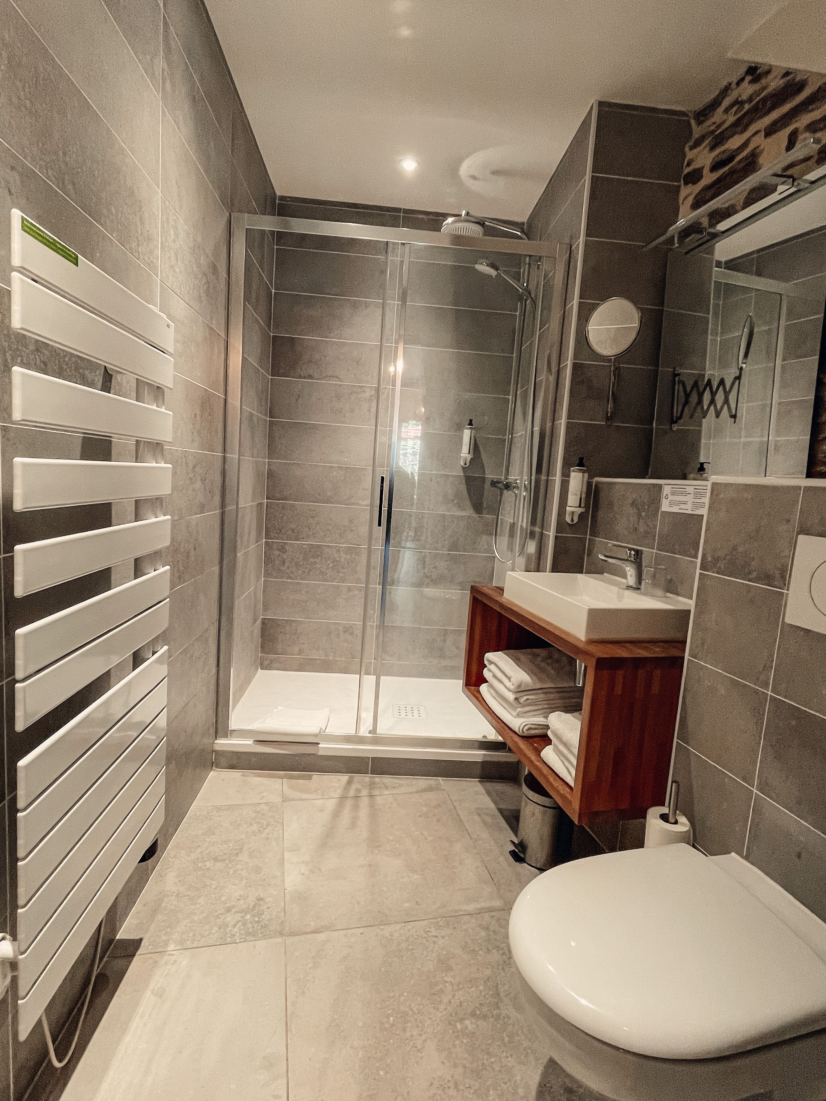 private studio with terrace | bathroom | shower, eco-friendly toiletries, hair dryer, towels