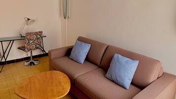 Departamento urbano | Área de sala de estar | Televisión