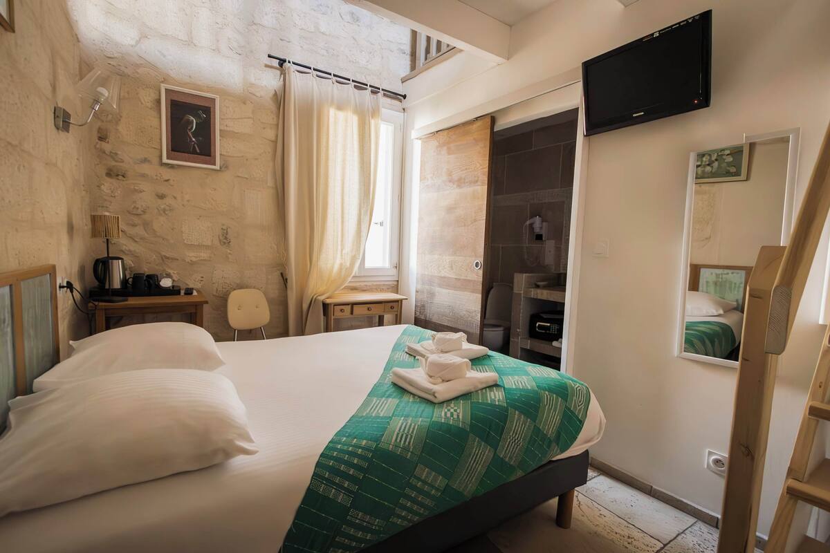 Habitación cuádruple | Ropa de cama de alta calidad y minibar