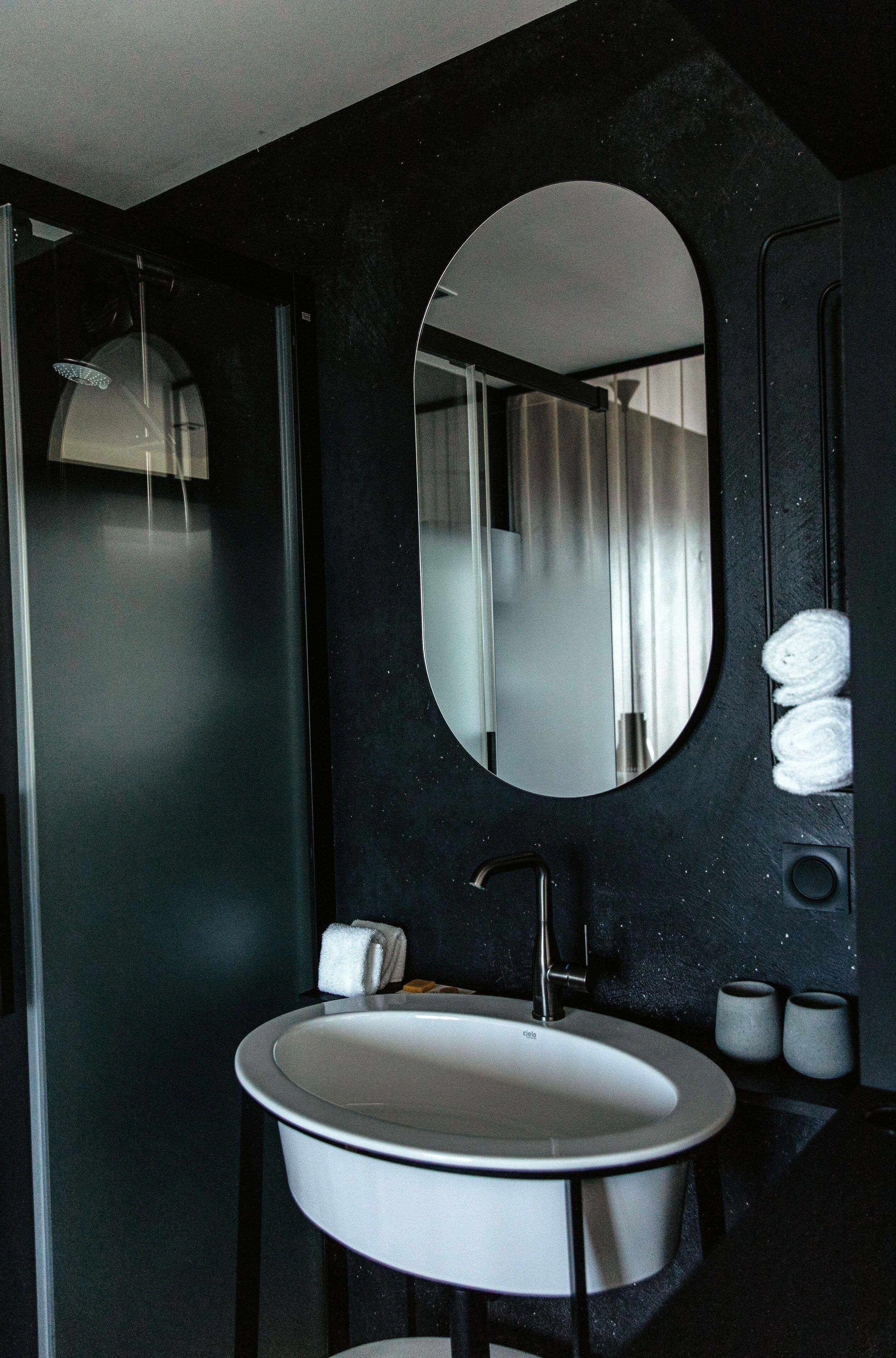 superior room | bathroom | shower, rainfall showerhead, eco-friendly toiletries, hair dryer