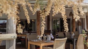 Dinner served, French cuisine, pool views