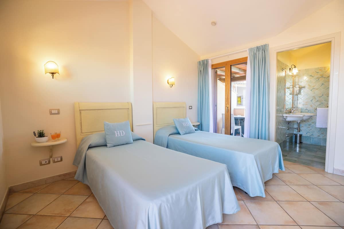 twin room | minibar, in-room safe, desk, iron/ironing board