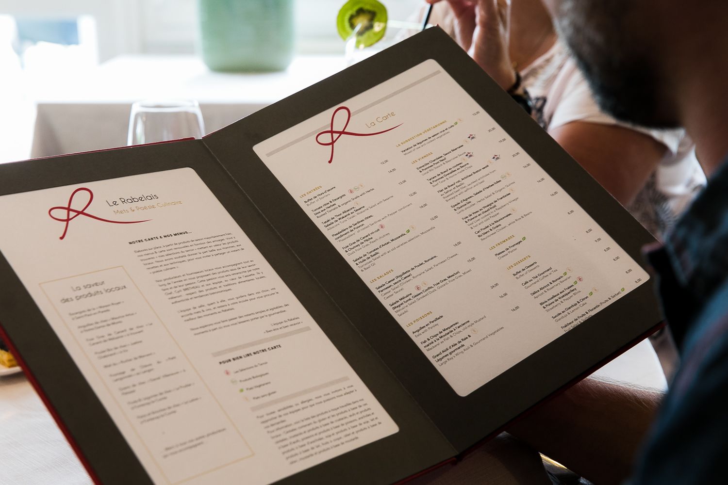A menu with the restaurant's name and a list of dishes.