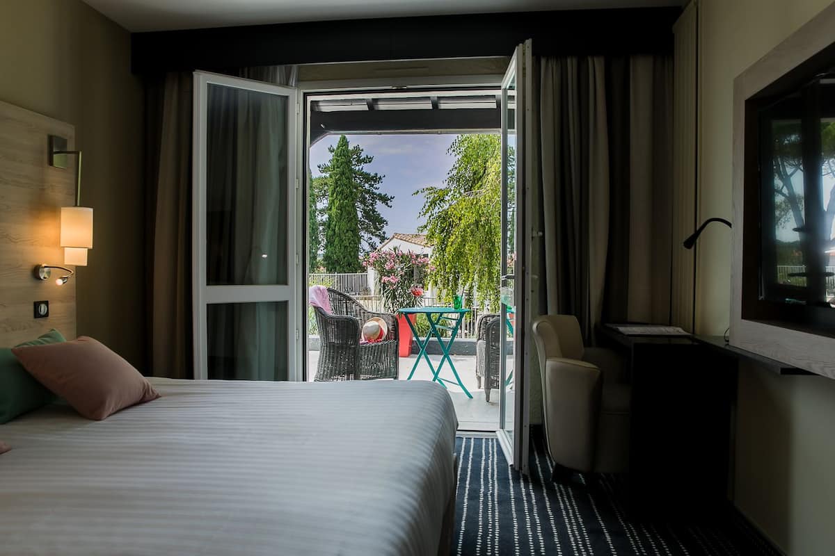 1 bedroom, desk, blackout curtains, iron/ironing board