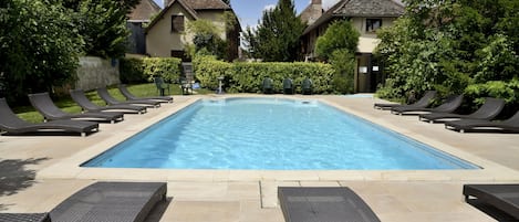 Outdoor pool, open 9:00 AM to 8:00 PM, sun loungers