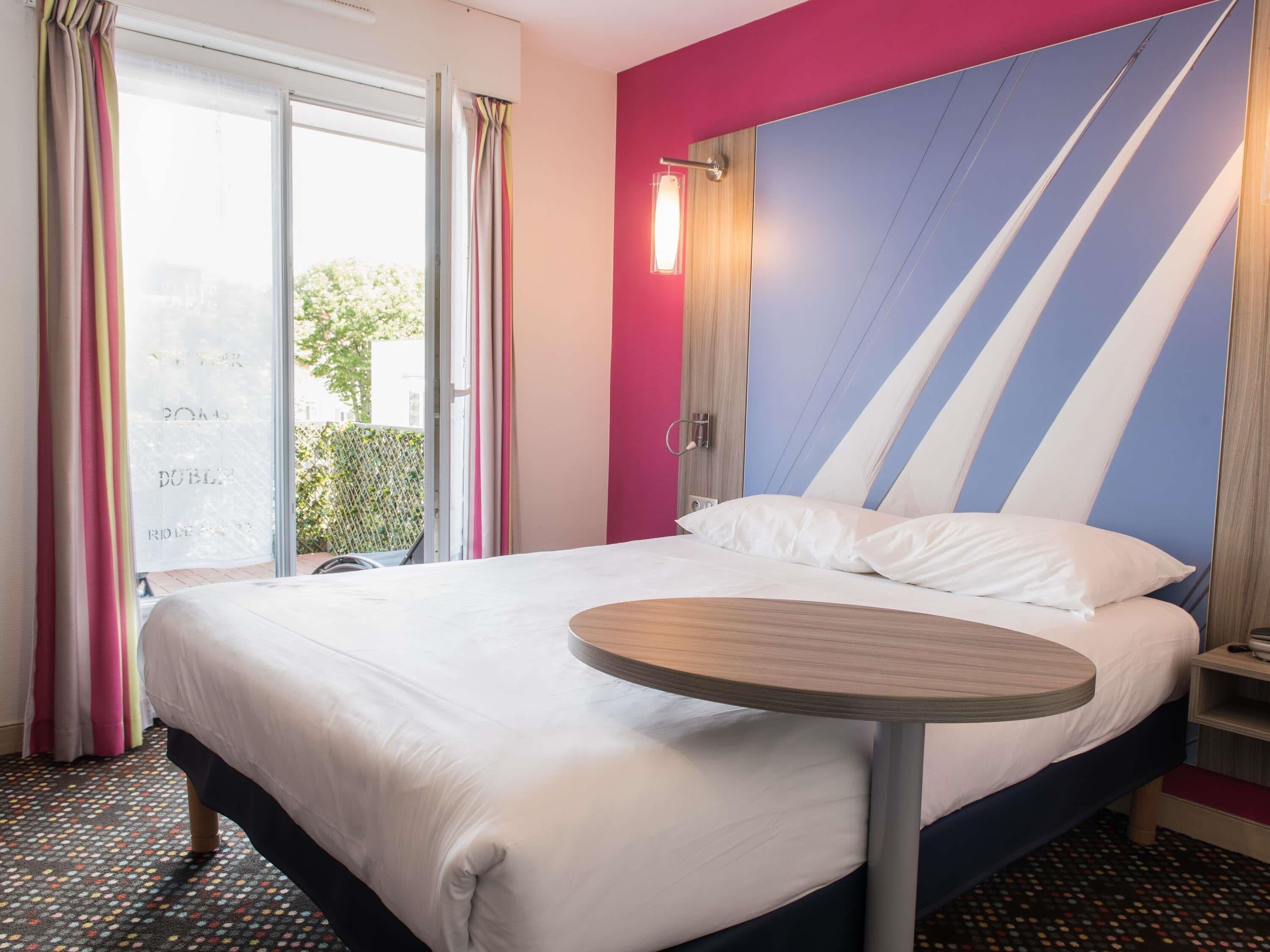 Premium bedding, pillow-top beds, desk, blackout curtains