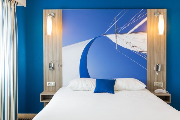 Premium bedding, pillow-top beds, desk, blackout curtains