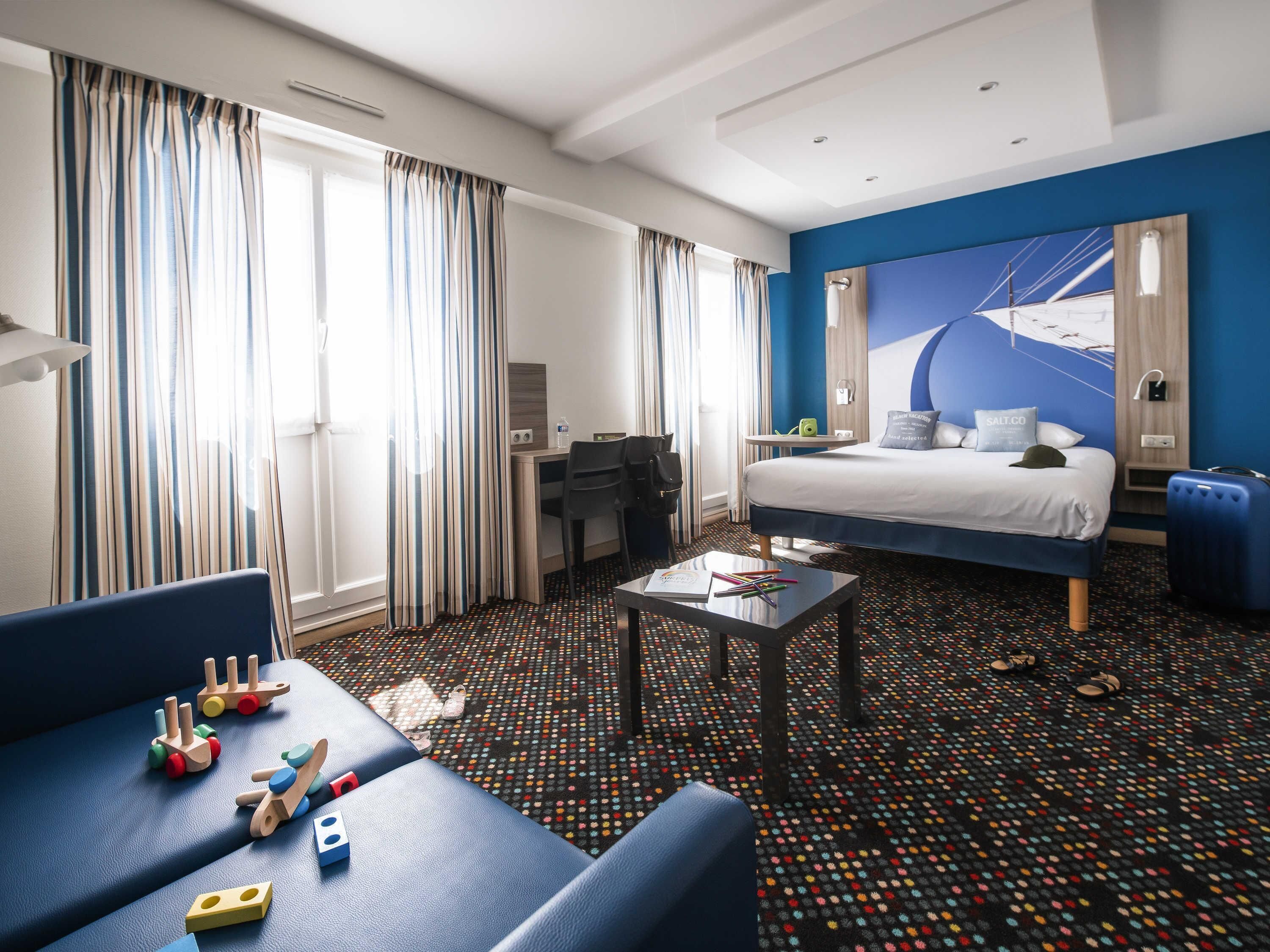 Premium bedding, pillow-top beds, desk, blackout curtains