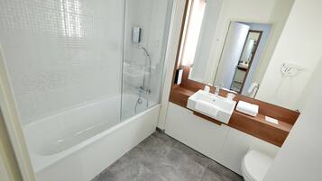 Eco-friendly toiletries, hair dryer, towels, soap