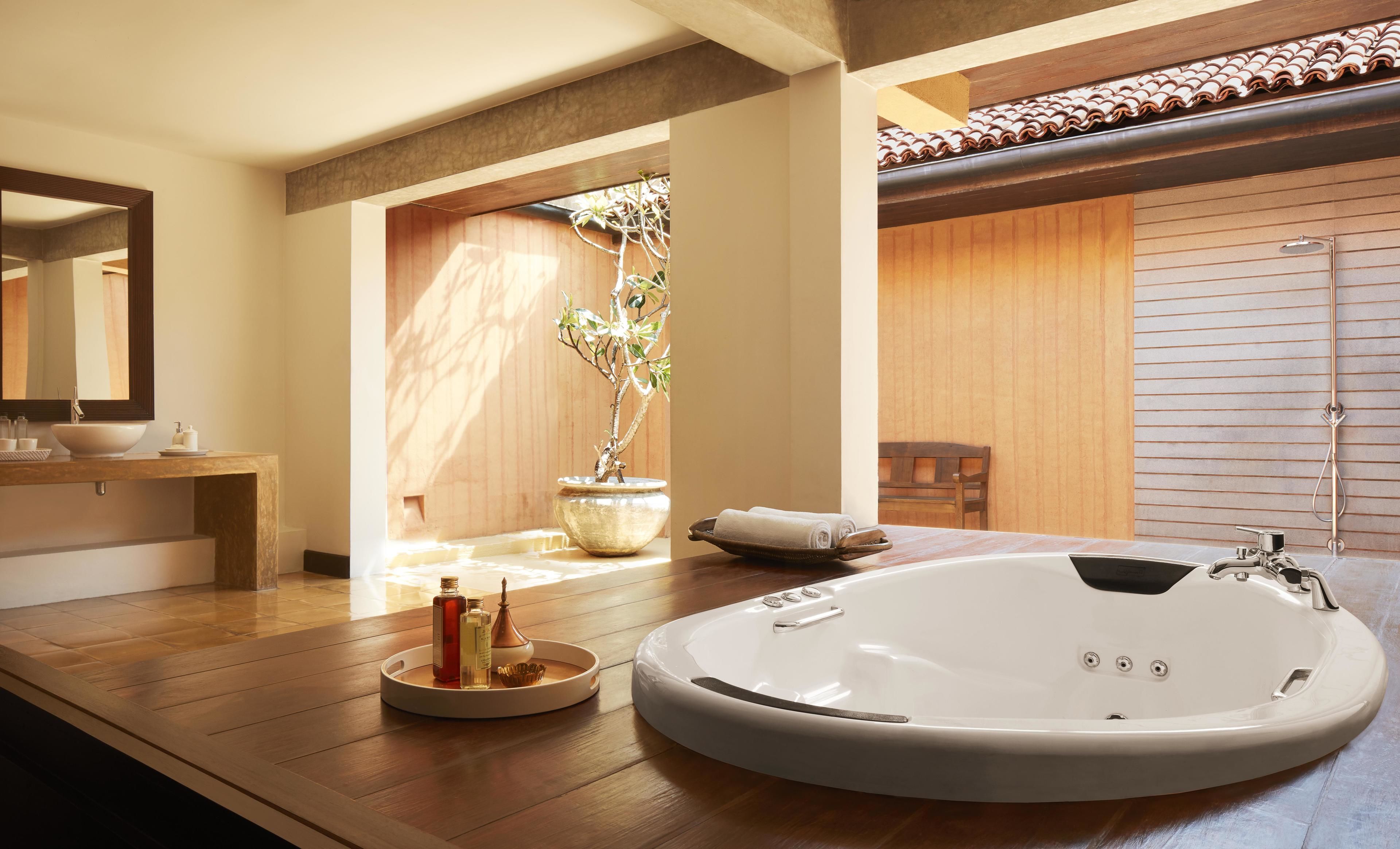 suite with sea view | bathroom | separate bathtub and shower, deep-soaking bathtub, rainfall showerhead