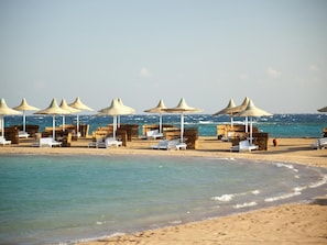 Private beach, sun-loungers, beach umbrellas, scuba diving