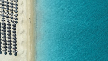 Perto da praia, serviço de traslado de/para a praia, toalhas de praia