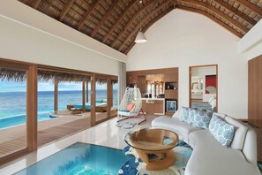 Supreme Overwater Two-bedroom Villa | Living room | 42-inch plasma TV with satellite channels, TV - W Maldives (Fesdu Island)