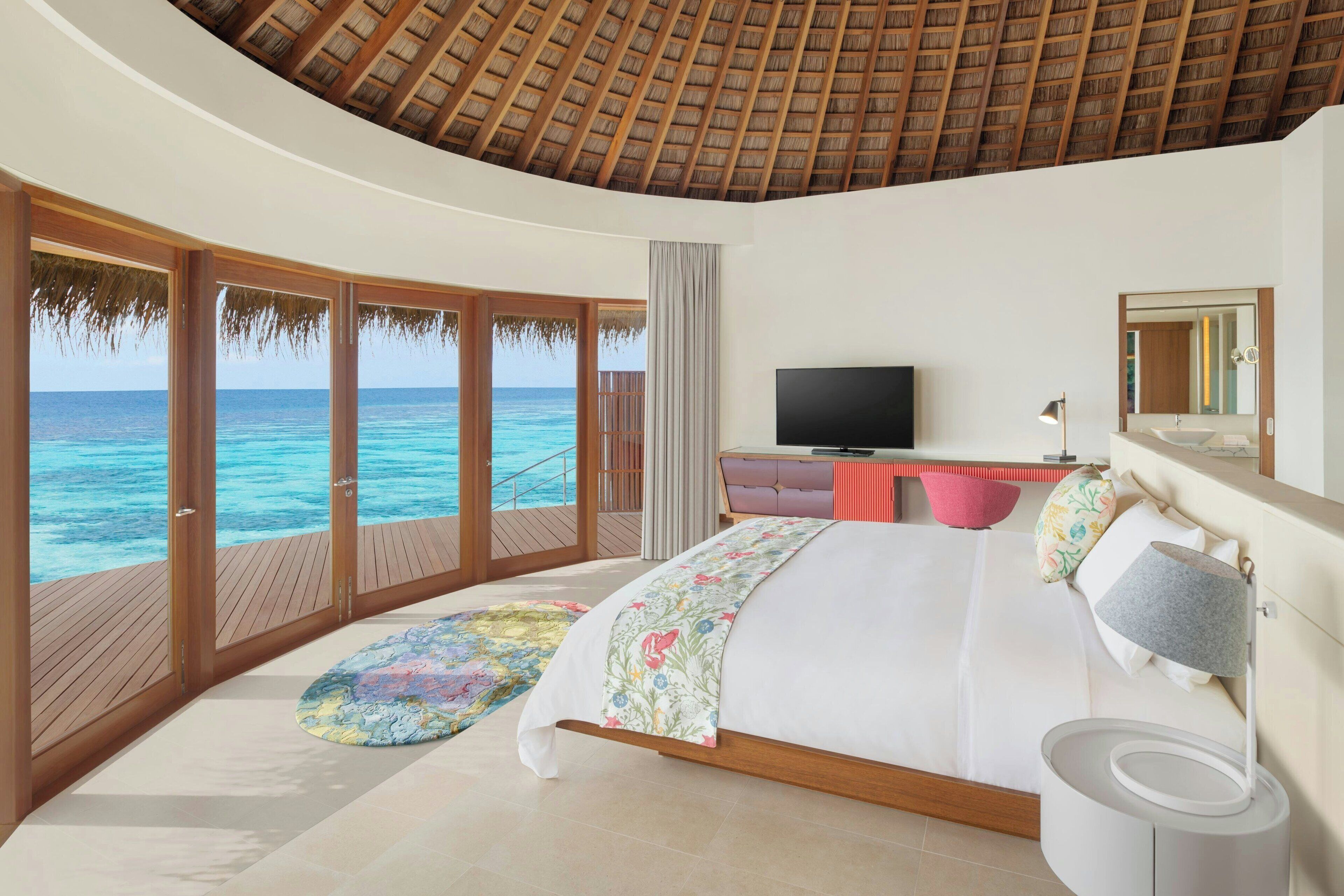 oasis overwater two-bedroom haven | premium bedding, down duvets, free minibar items, in-room safe