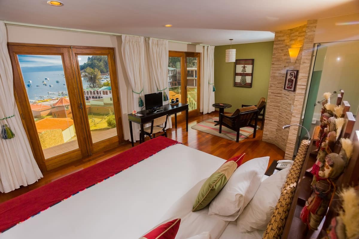 Premium Double Room, 1 King Bed, Balcony, Lake View | In-room safe, desk, laptop workspace, blackout drapes