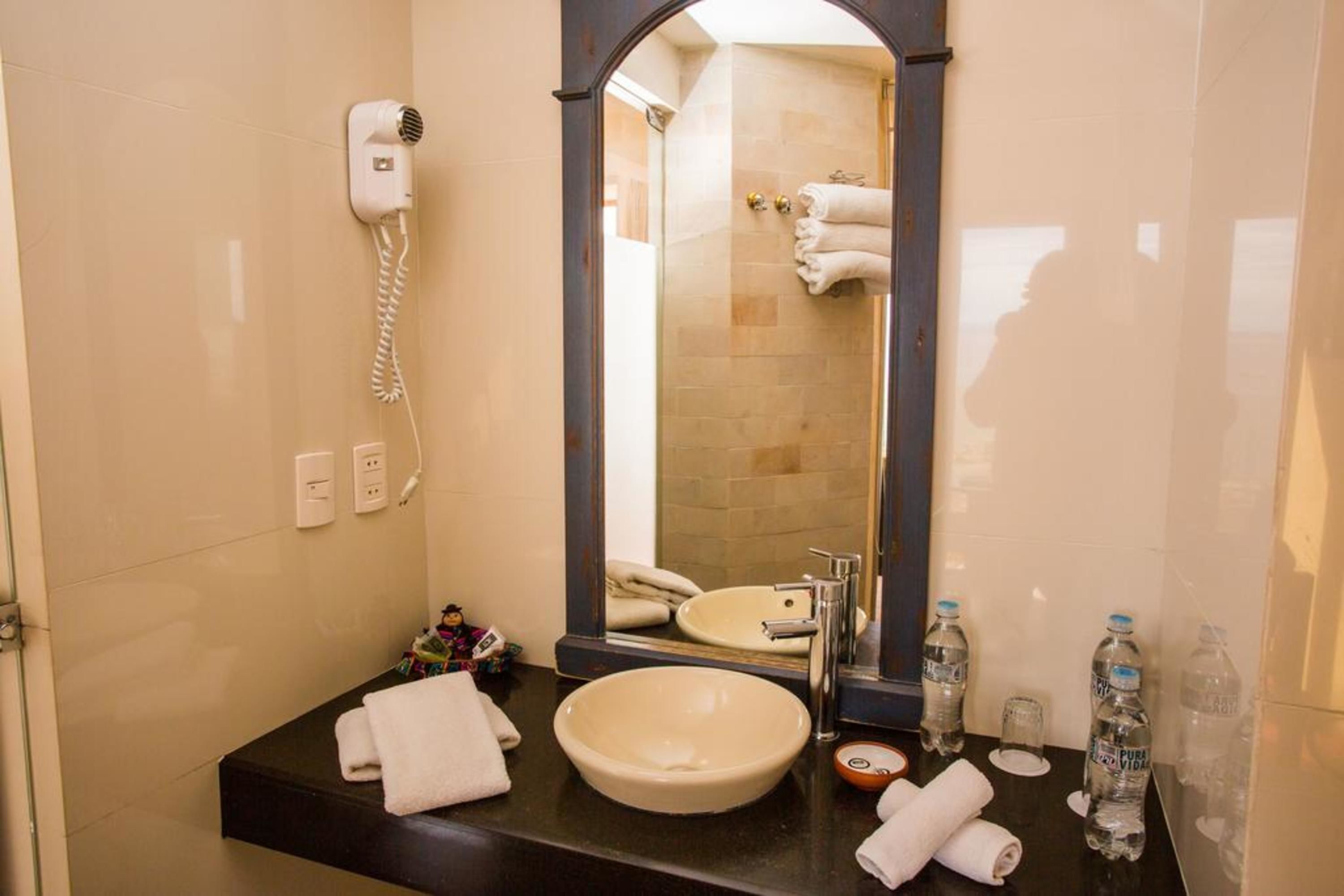 family suite, 2 bedrooms, lake view | bathroom | deep-soaking bathtub, rainfall showerhead, free toiletries, hair dryer