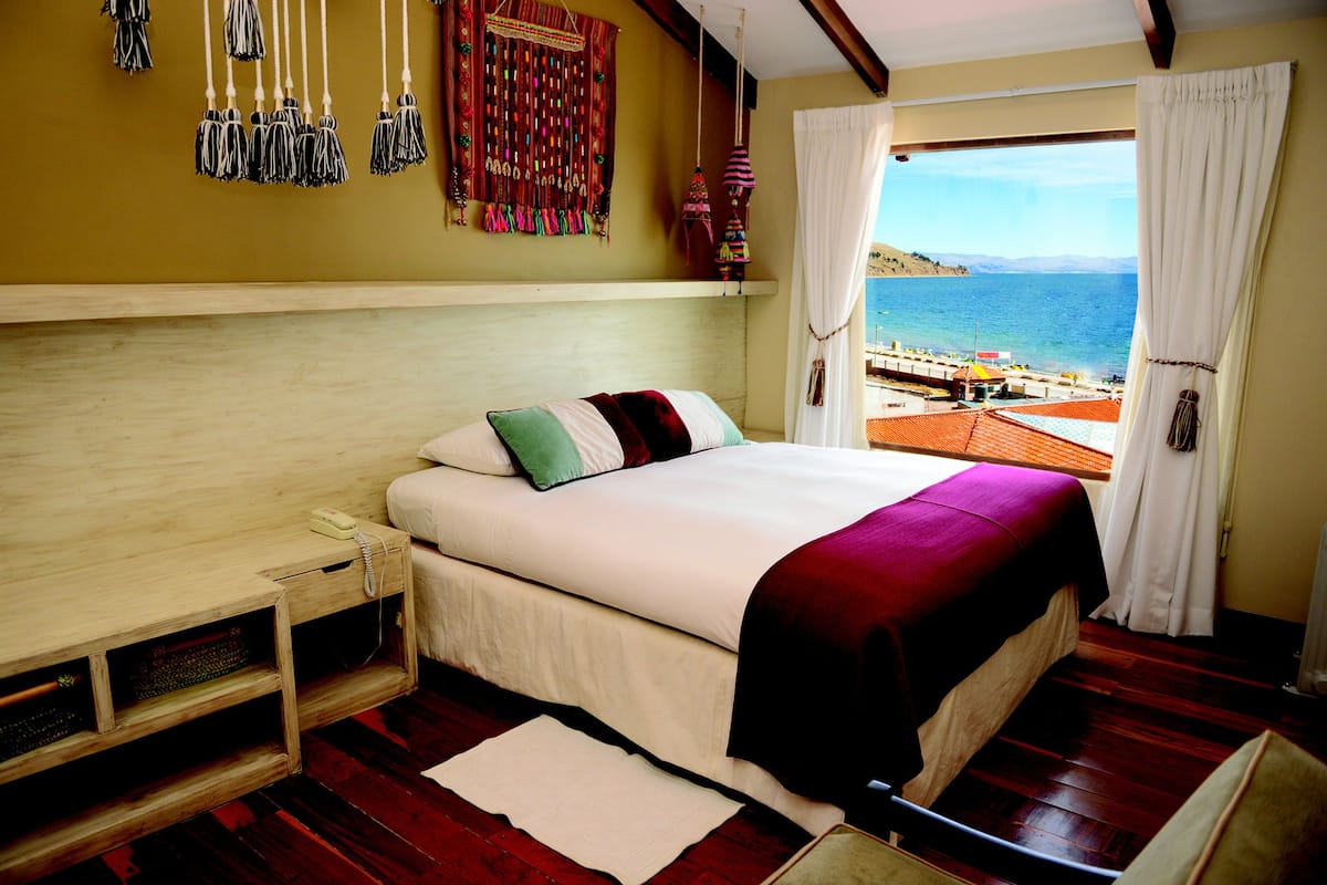 Family Suite, 2 Bedrooms, Lake View | In-room safe, desk, laptop workspace, blackout drapes