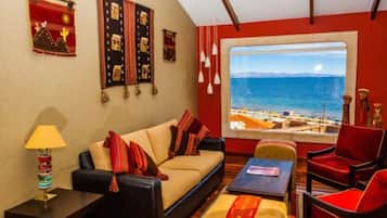 Family Suite, 2 Bedrooms, Lake View | Living area | Flat-screen TV