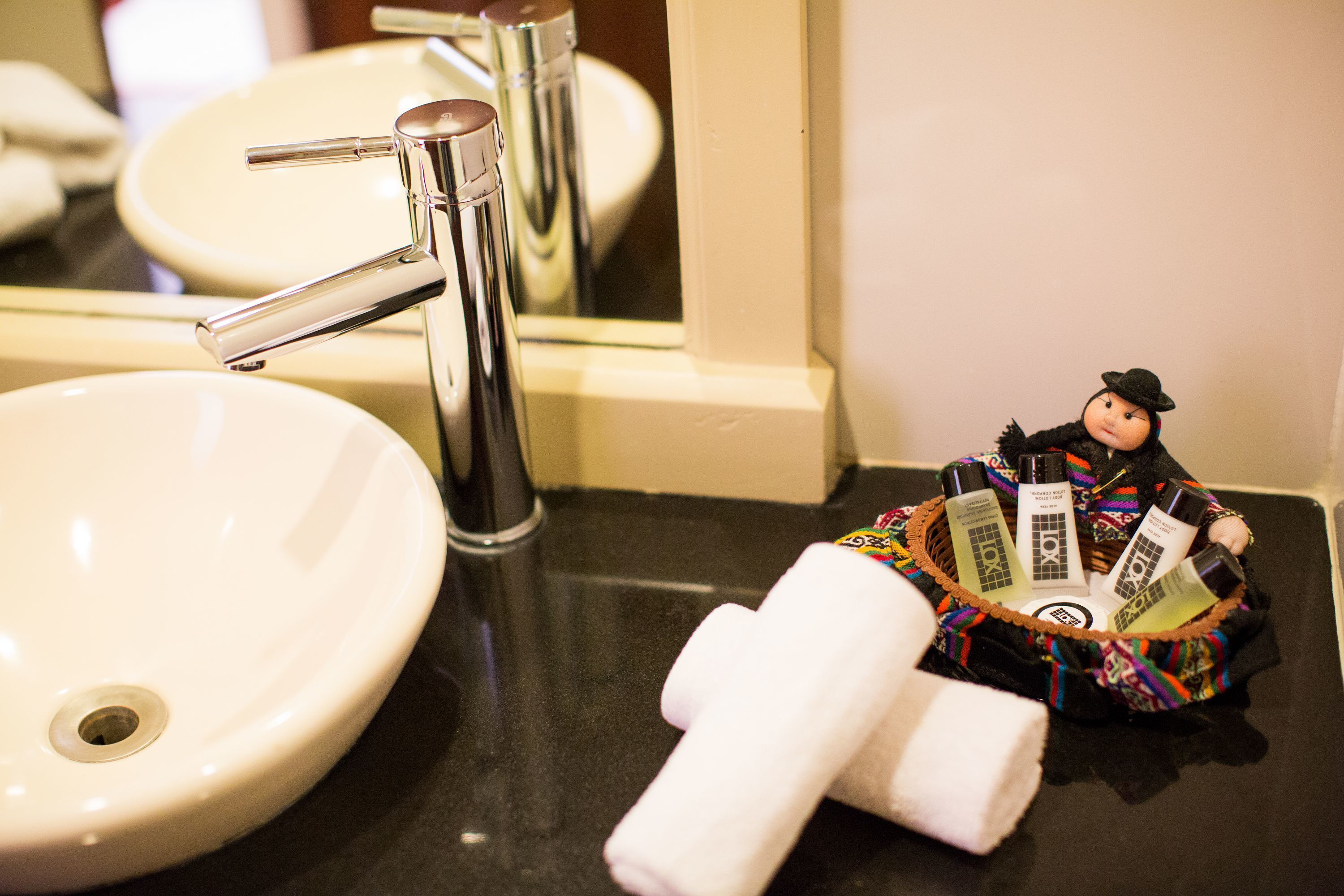 deep-soaking bathtub, rainfall showerhead, free toiletries, hair dryer