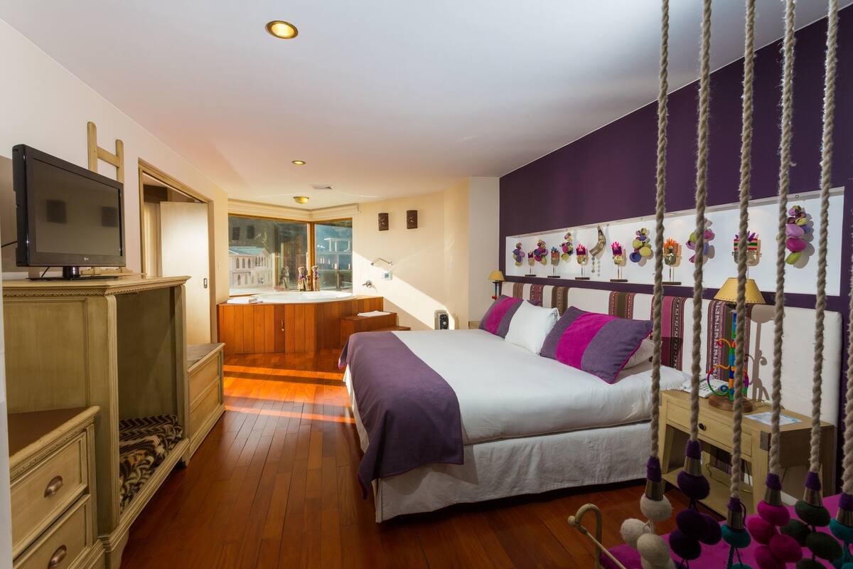 Deluxe Suite, 2 Bedrooms, Jetted Tub | In-room safe, desk, laptop workspace, blackout drapes