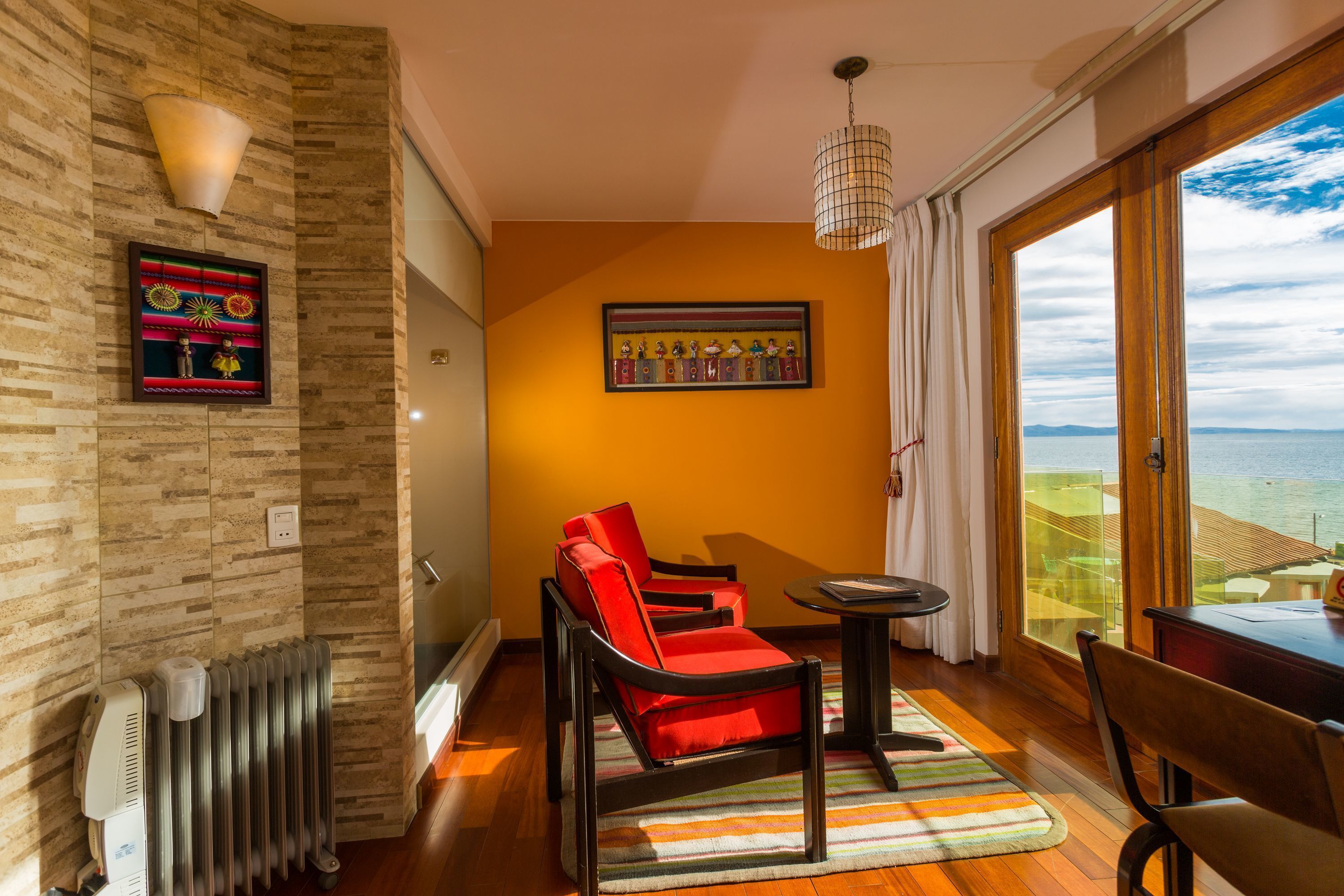 premium double room, 1 king bed, balcony, lake view | living area | flat-screen tv