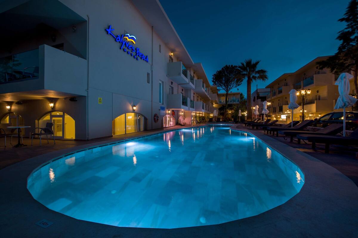 indoor pool, seasonal outdoor pool, pool umbrellas, pool loungers