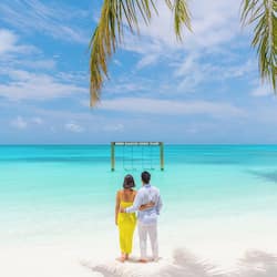 On the beach, white sand, beach towels, scuba diving