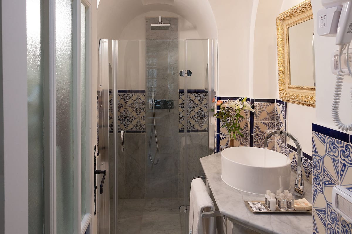 room (luxe) | bathroom | separate bathtub and shower, hair dryer, bathrobes, slippers