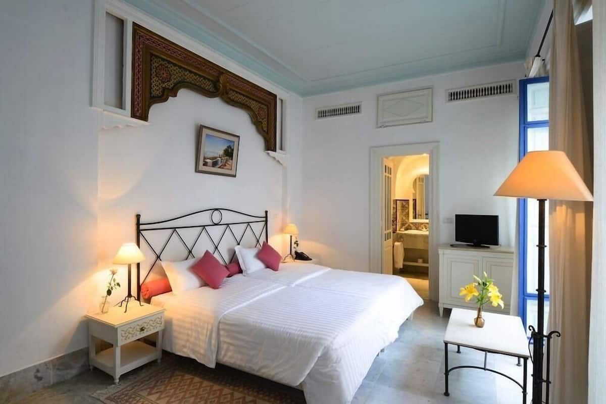Ropa de cama de alta calidad y minibar 