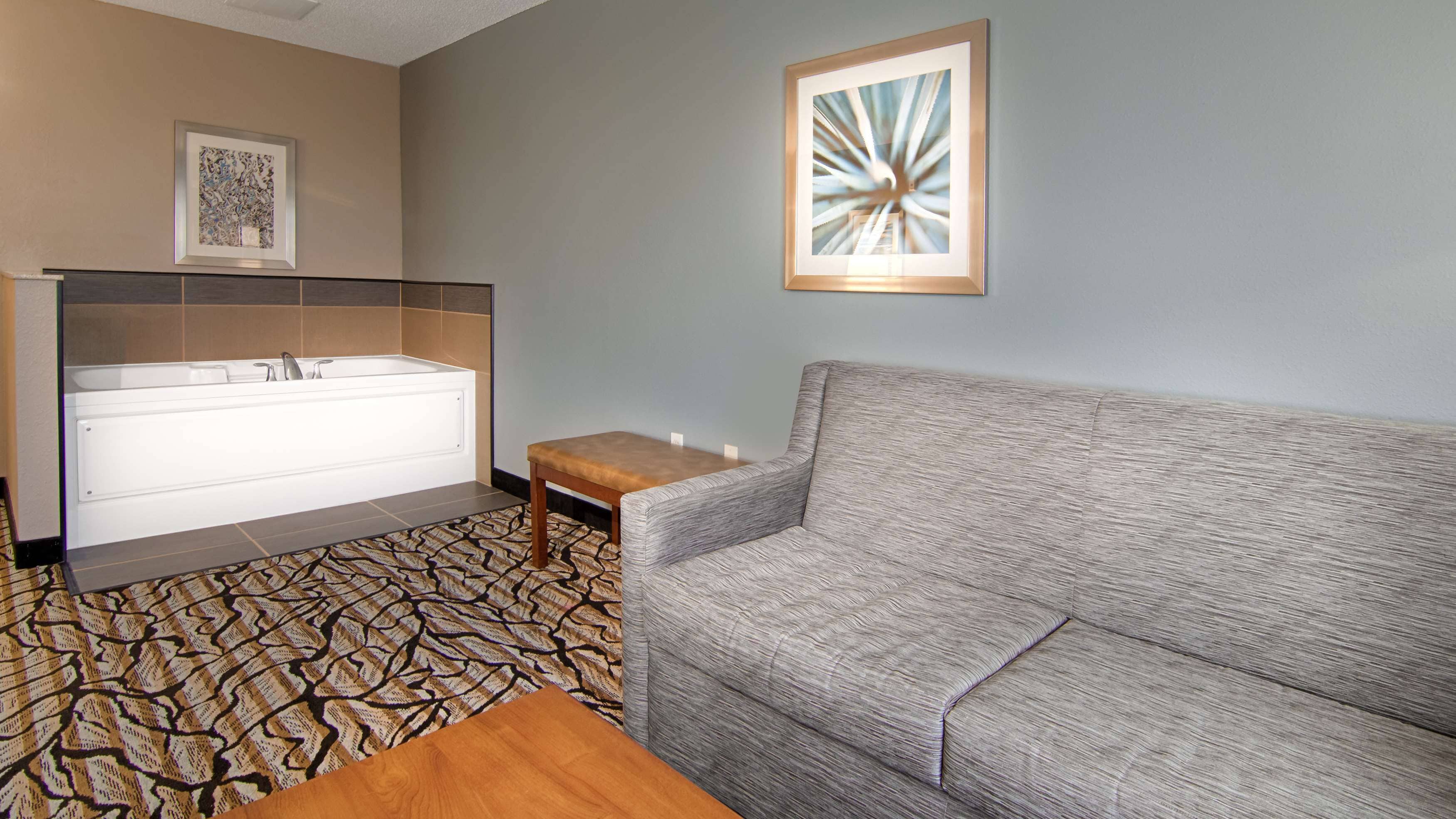 desk, laptop workspace, blackout curtains, iron/ironing board