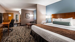 Desk, laptop workspace, blackout drapes, iron/ironing board