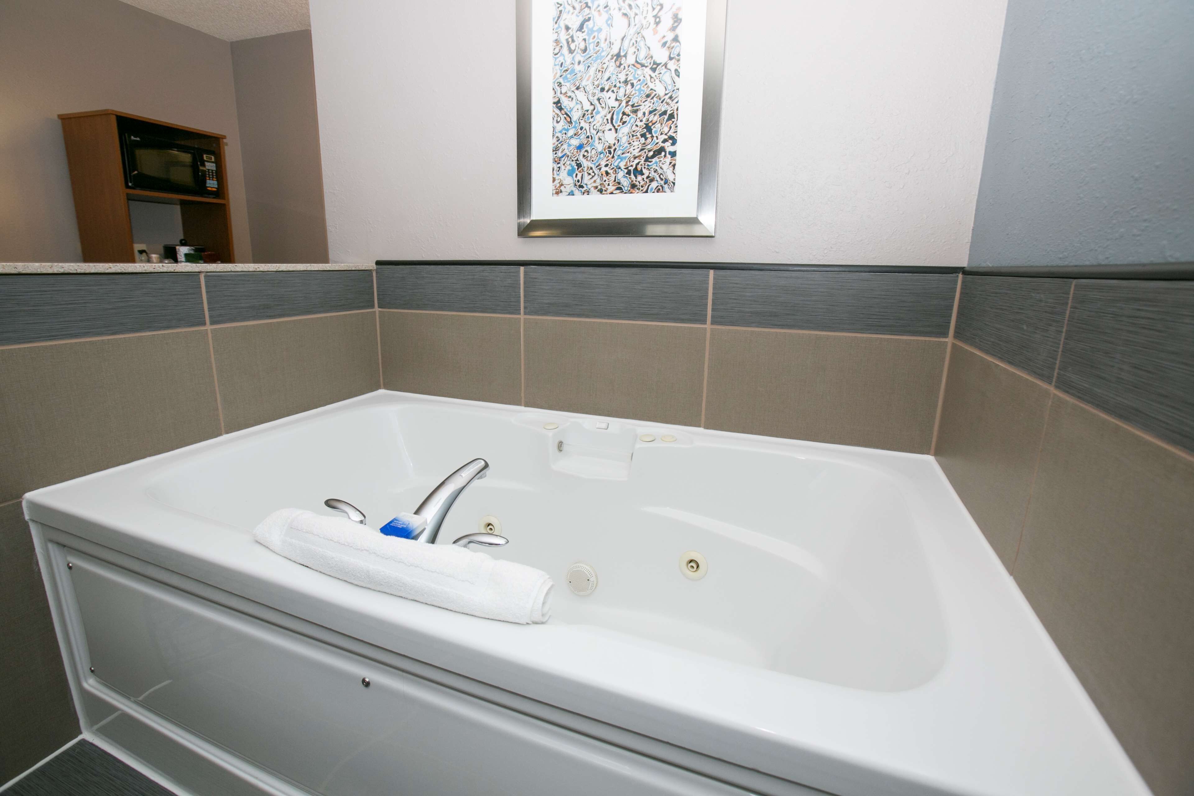 desk, laptop workspace, blackout curtains, iron/ironing board