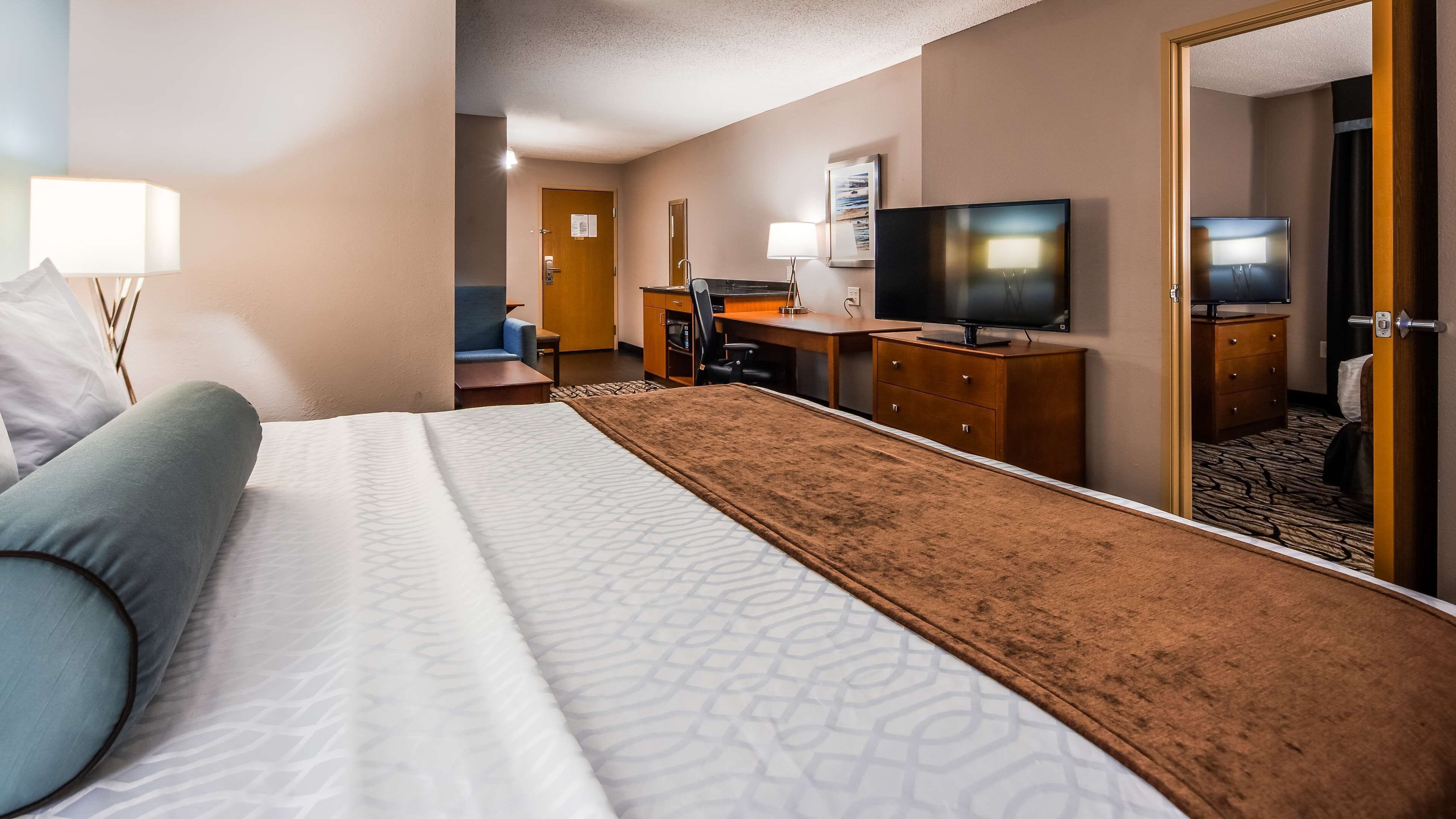 desk, laptop workspace, blackout curtains, iron/ironing board