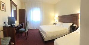 Minibar, desk, laptop workspace, blackout curtains