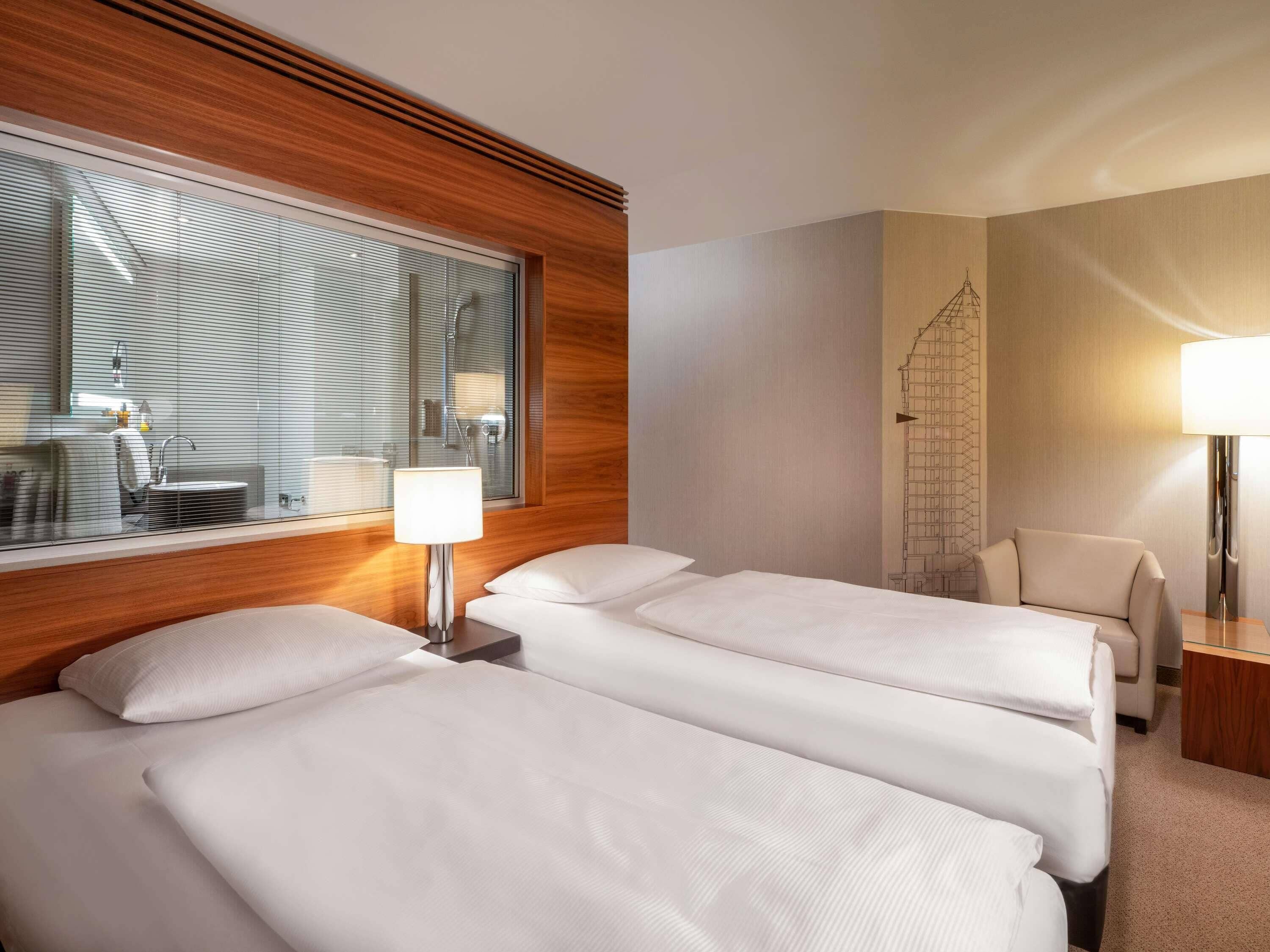 Hypo-allergenic bedding, pillowtop beds, in-room safe, desk