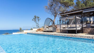 2 outdoor pools, pool umbrellas, sun loungers