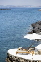 Private beach, sun loungers, beach umbrellas, beach bar