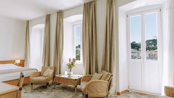 Junior Suite with Sea View and Balcony | Minibar, in-room safe, desk, blackout drapes