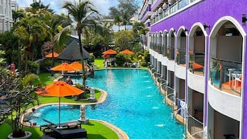 2 outdoor pools, open 7:00 AM to 7:00 PM, pool umbrellas