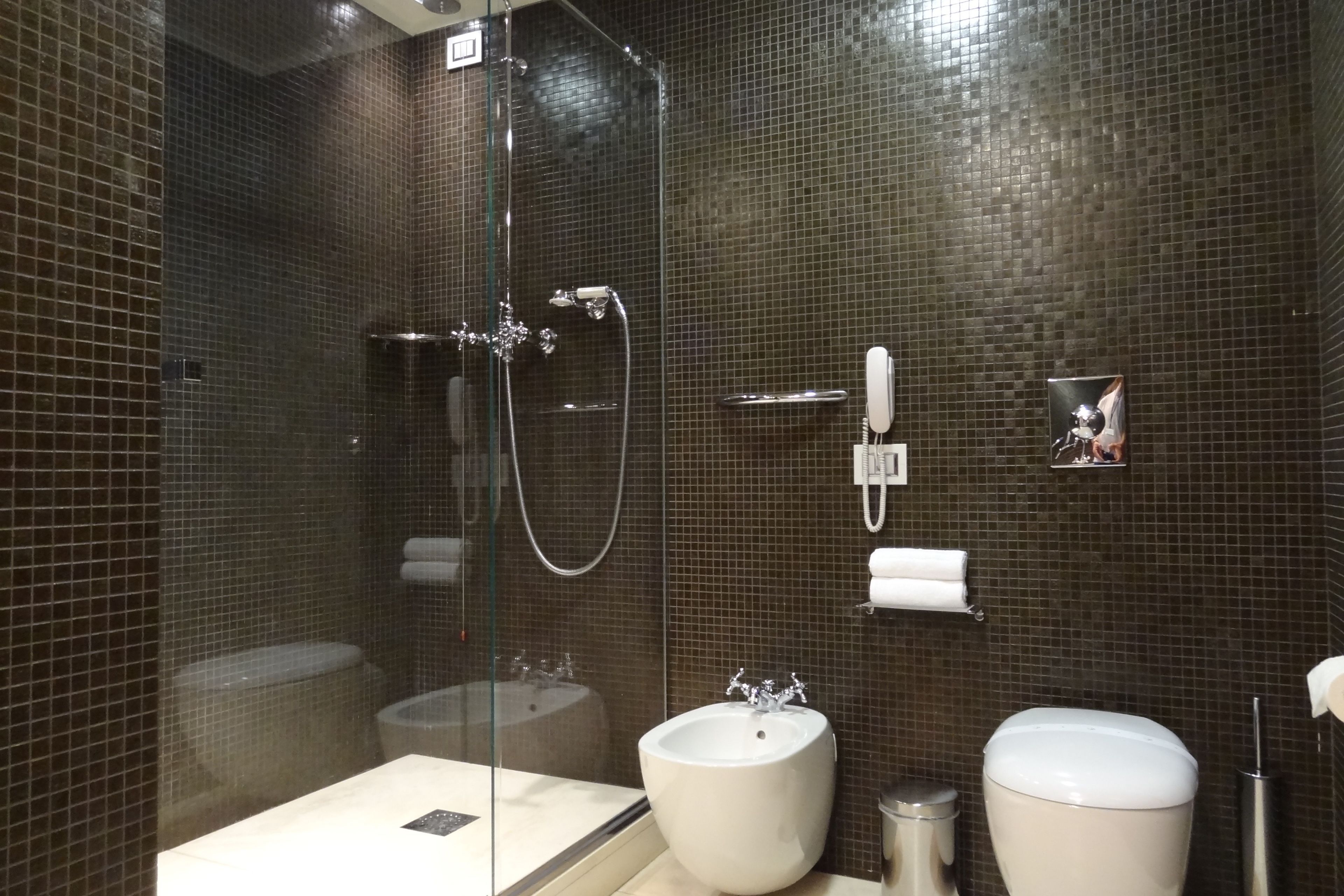 suite (art room) | bathroom | hair dryer, slippers, bidet, towels