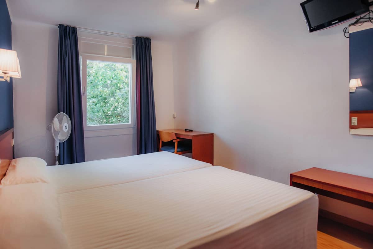 Double Room | Desk, blackout drapes, WiFi (free), bed sheets