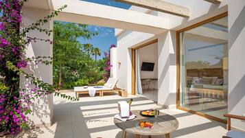 Suite Premium, terraza, vistas al jardín | Sábanas de algodón egipcio y ropa de cama de alta calidad