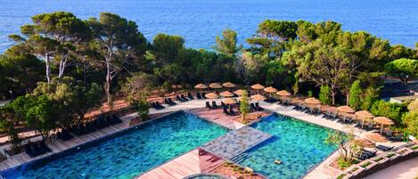 Seasonal outdoor pool, pool loungers